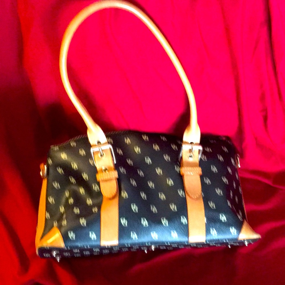Dooney & Bourke small satchel.  Gently used.  Original colors and designs.